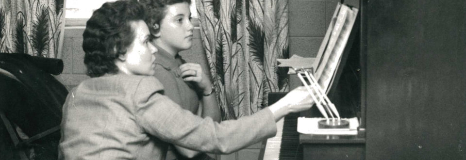 Claudia Boldon teaching piano lesson 1961